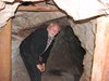 Dick Standing in the Mine Opening