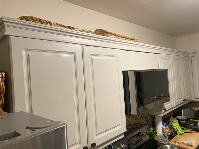 Added crown molding to kitchen cabinets