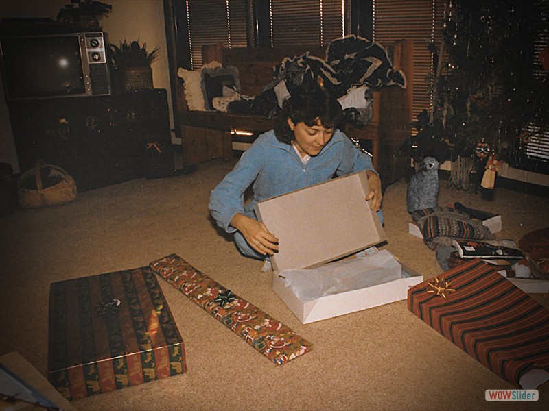 Deb opening Christmas presents