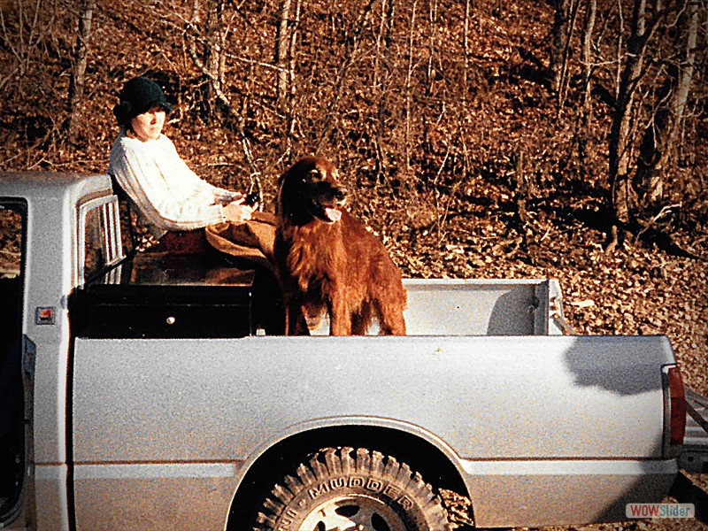 Deb with JJ in back of pickup truck